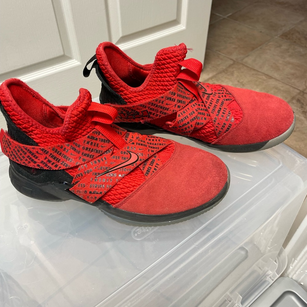 Two pairs me a basketball shoes. SZ 7. Gently worn. Excellent condition.